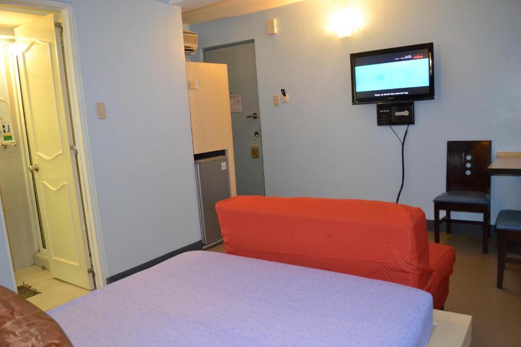 Franchise One Hotel Makati City Room photo